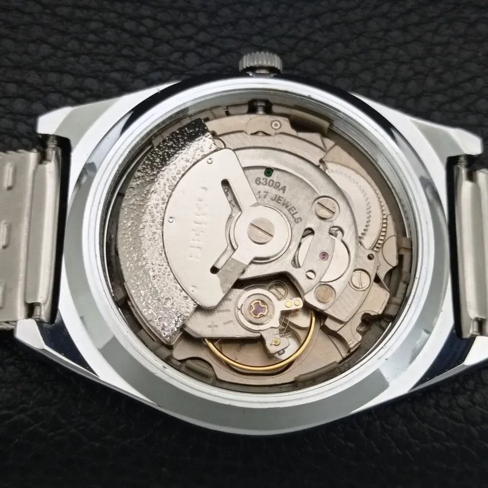 Vintage 1971 Seiko Automatic Mens Silver Watch W/daydate & Silver accents